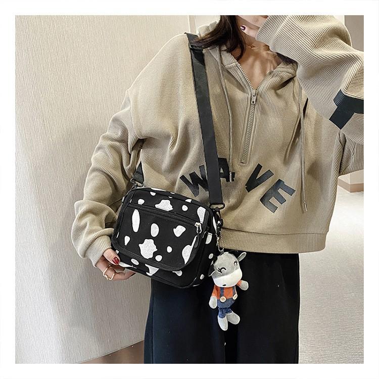 TÚI ĐEO CHÉO NAM NỮ HỌA TIẾT BÒ SỮA