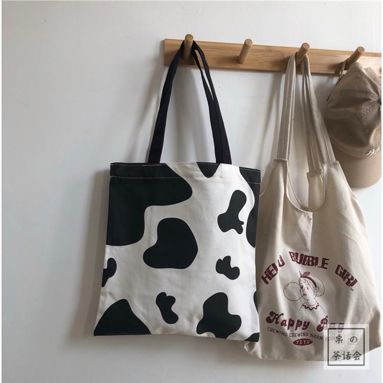 Túi tote họa tiết bò sữa thời trang cho nam và nữ kiểu mới có khóa kéo vừa A4 style Kitishop️