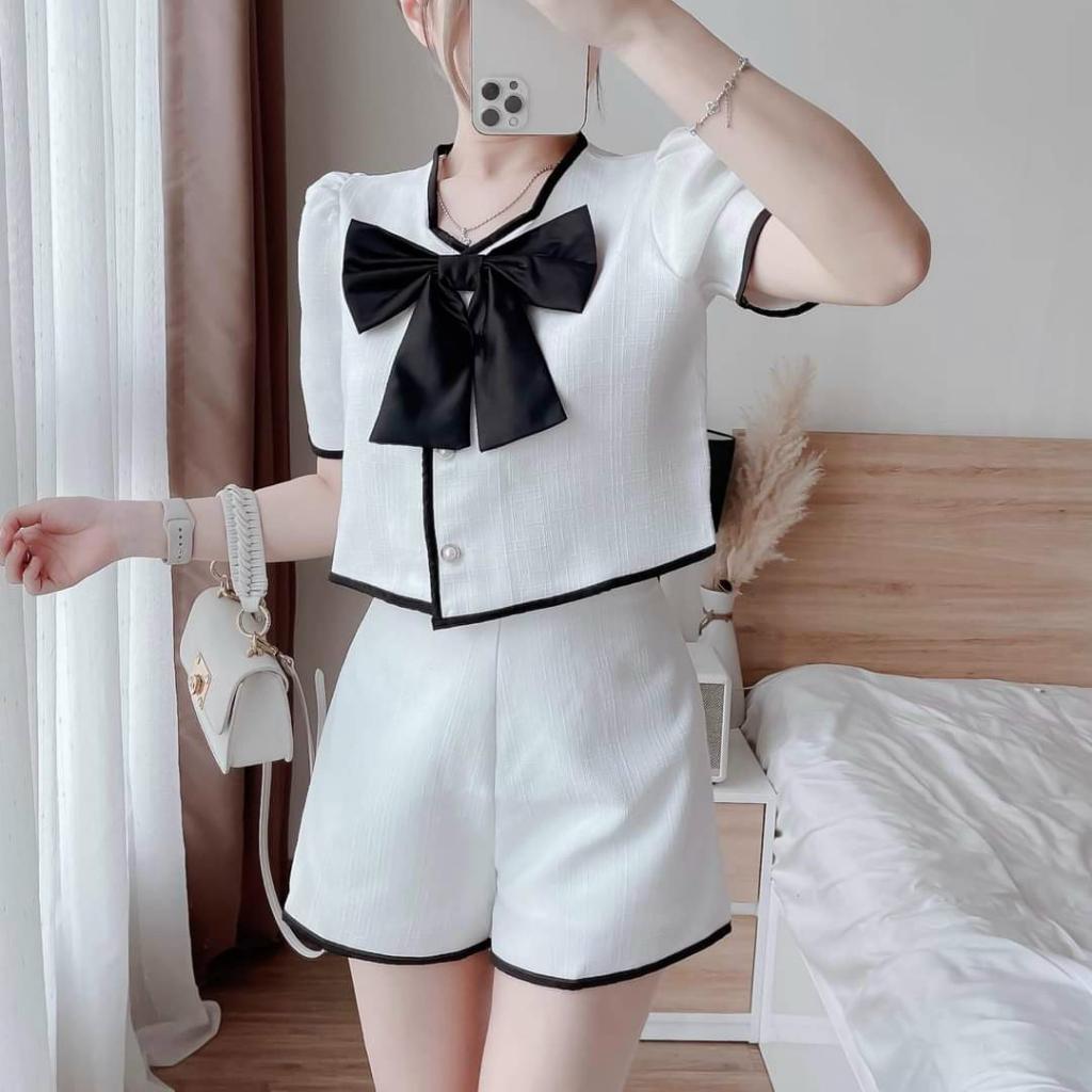 Sét áo viền lửng cài nút kèm nơ và quần sooc ngắn