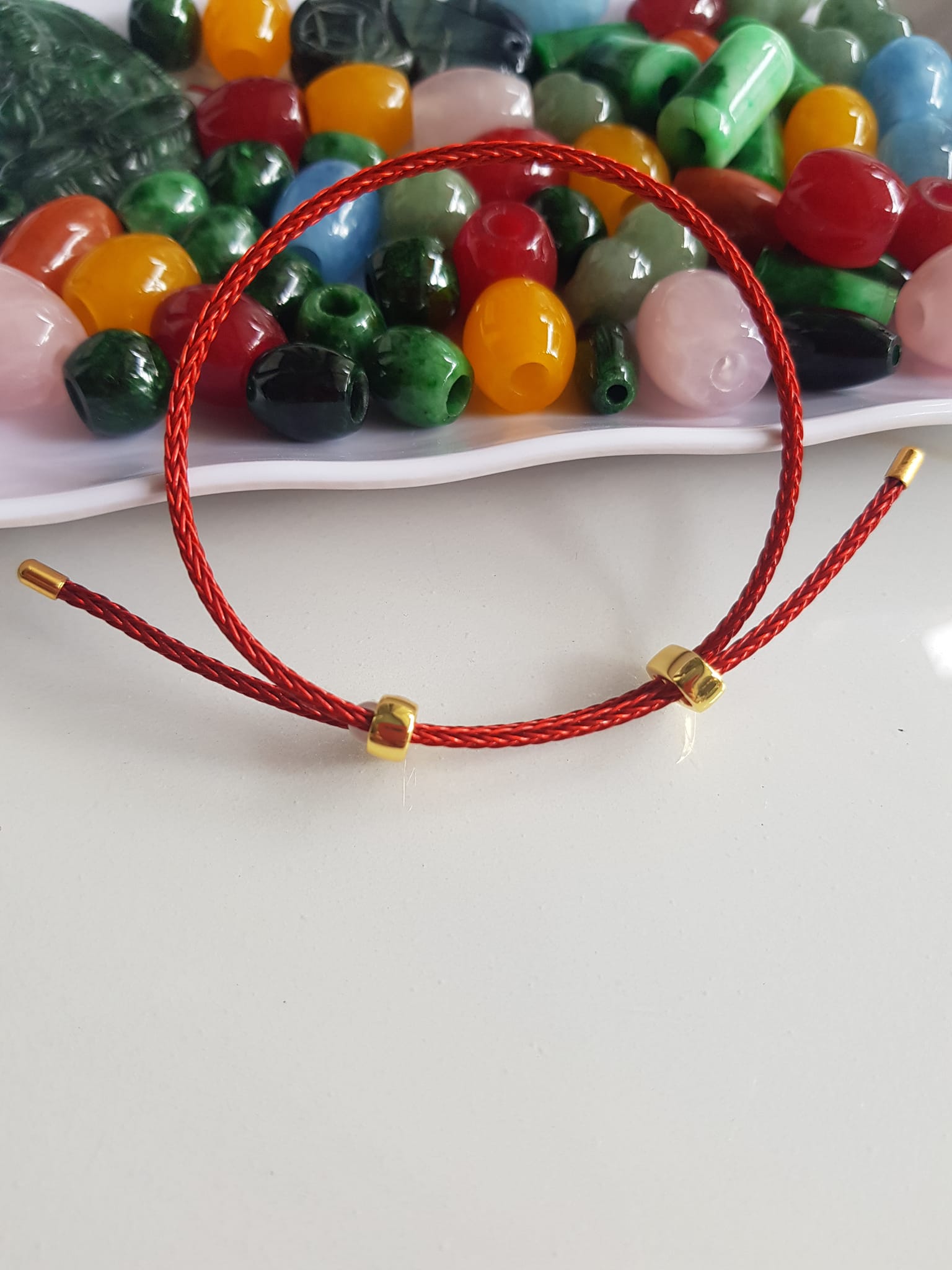Dây thun Đỏ dẻo phối vòng tay hạt lu thống  Size dây đỏ 2mm   Nữ đã có hạt lu thống thì đây chính là sợi dây thun phối với hạt lu thống đeo xinh ạ