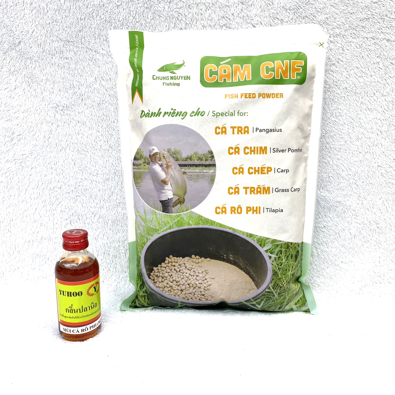 Mồi Câu Cá Rô Phi , Combo 1kg Cám CNF + 1 Chai Tinh Mùi Thái Lan M21 Chuyên Câu Cá Rô Phi