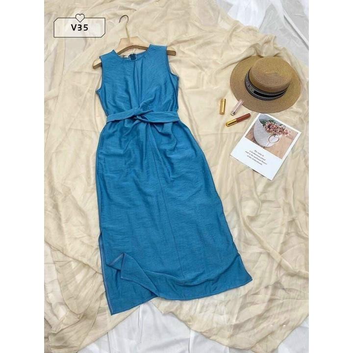 Đầm suông đũi xoắn eo xẻ tà y hình