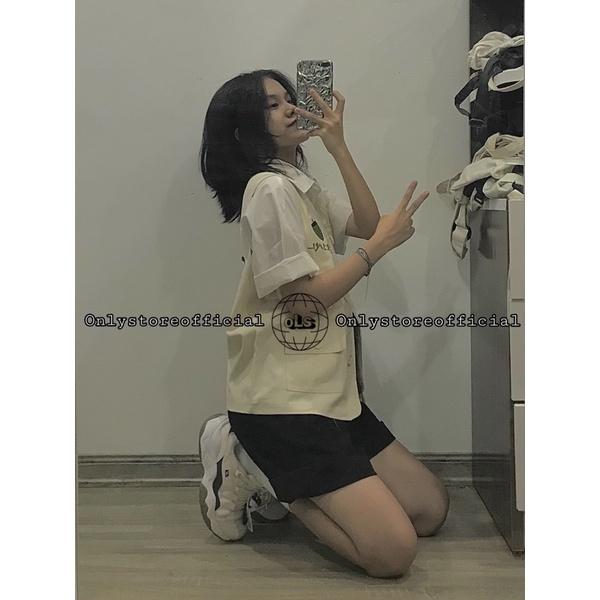 Áo gile dâu be với áo sơ mi trắng cơ bản và quần đùi đenxinh xắn