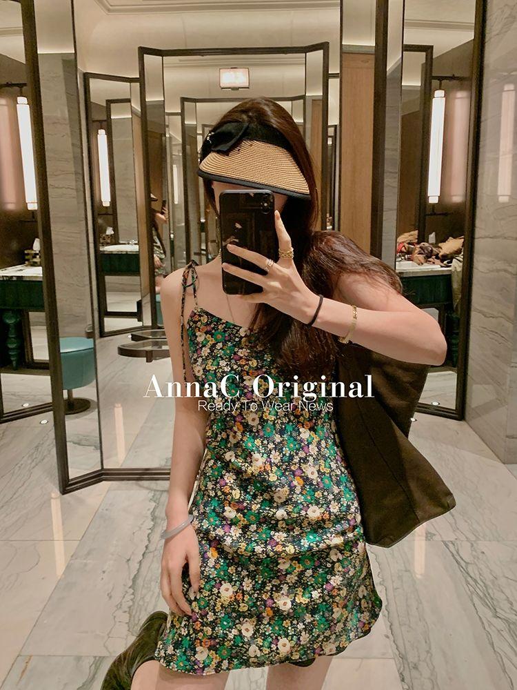 DONGSHOP 2023 Mùa hè Hàn Quốc cổ điển sling váy hoa mảnh đầm thiết kế phụ nữ nhỏ v cổ khí chất một từ váy ngắn