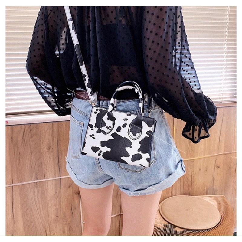 Túi đeo chéo bò sữa