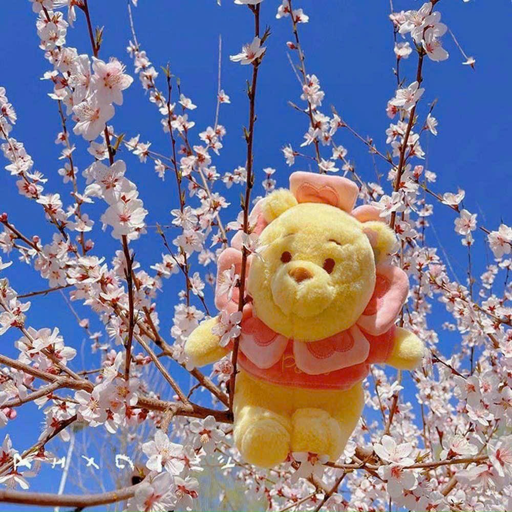 Gấu bông Pooh vàng hoa mặt trời áo nhung hồng thêu logo, hàng Quảng Châu cao cấp