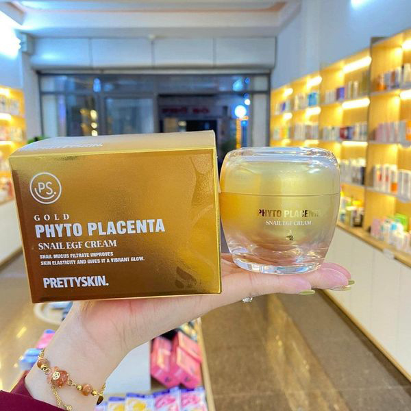 Kem ốc sên phục hồi dưỡng trắng chống lão hóa Pretty Skin Gold Phyto Placenta Snail EGF Cream 50ml tặng móc khóa