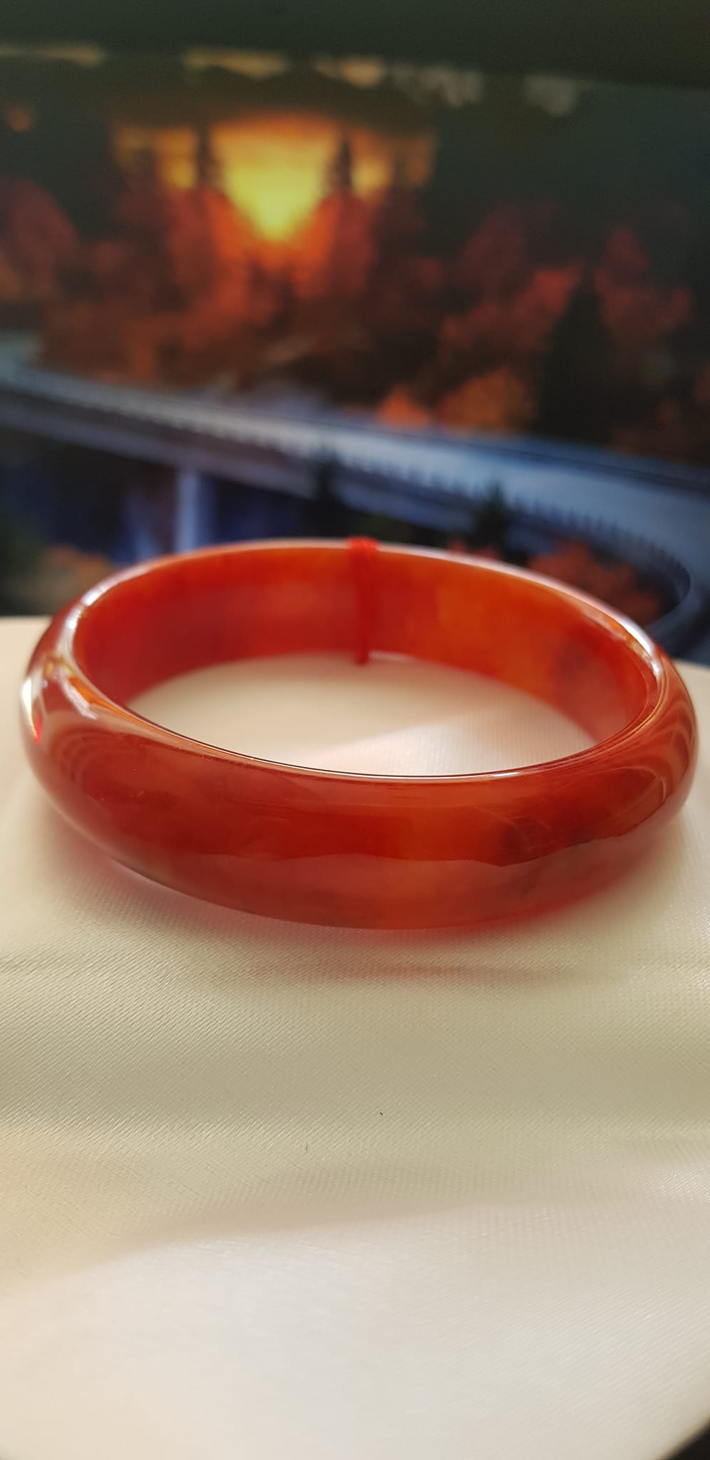 Vòng tay phong thuỷ Đá Cẩm Thạch mới Bản Hẹ Đỏ 58mm x cao 15mm x dầy 7mm Vòng màu đỏ cam tươi bóng đẹp chuẩn hợp nữ mệnh hỏa mệnh thổ Nữ nặng 56kg - 66kg đeo đẹp ạ