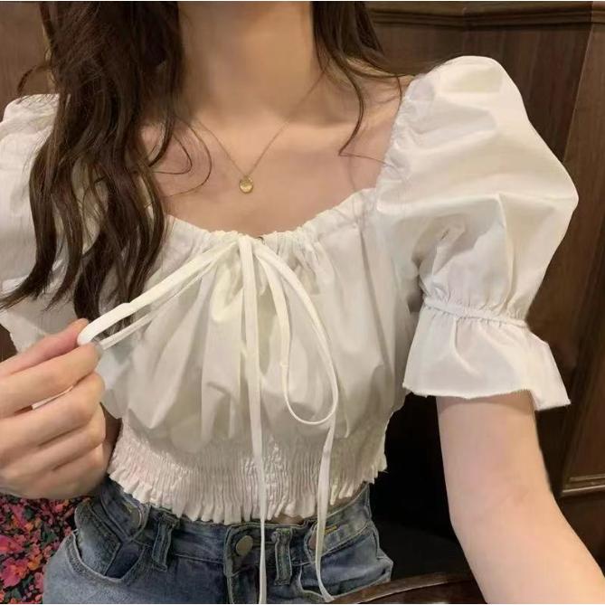 Áo kiểu nữ croptop bánh bèo trễ vai buộc nơ trước thời trang NIEVE