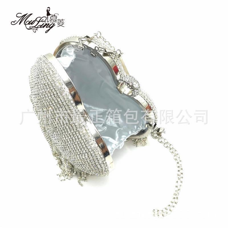 Clutch- ví cầm tay trái tim đính đá tua rua- túi xách đính đá hình tim siêu xinh