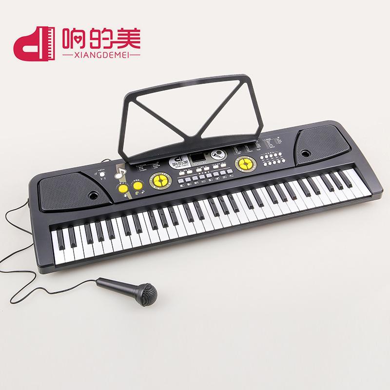 Khuyến mại âm thanh đẹp đàn organ điện tử 61 phím dành cho trẻ em quà tặng giáo dục đồ chơi thông minh có micrô đàn piano