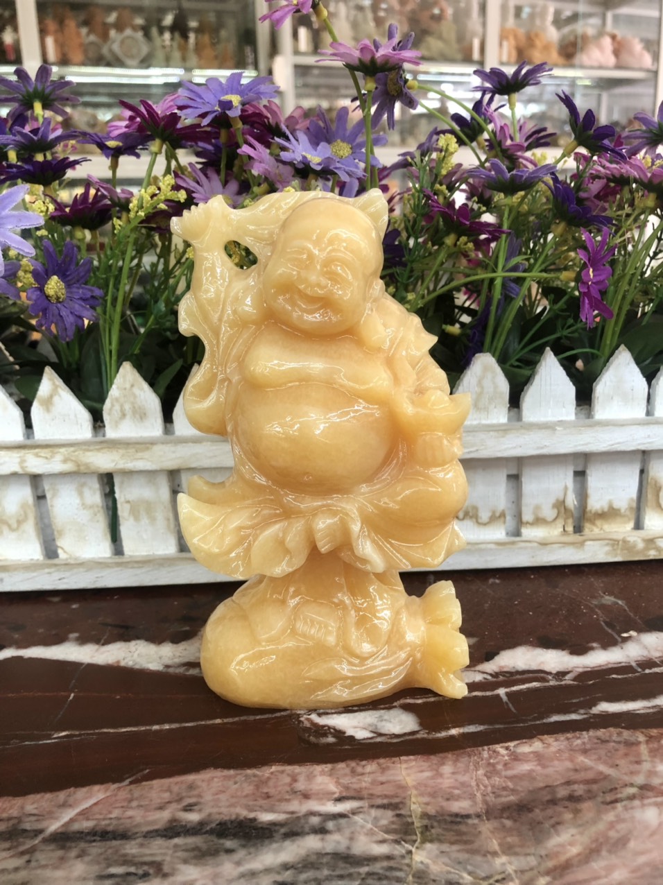 Tượng Phật Di Lặc đứng trên túi tiền phong thủy đá ngọc hoàng long trang trí bàn làm việc - Cao 15cm