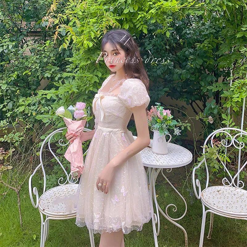 Váy trắng tay bồng lấp lánh