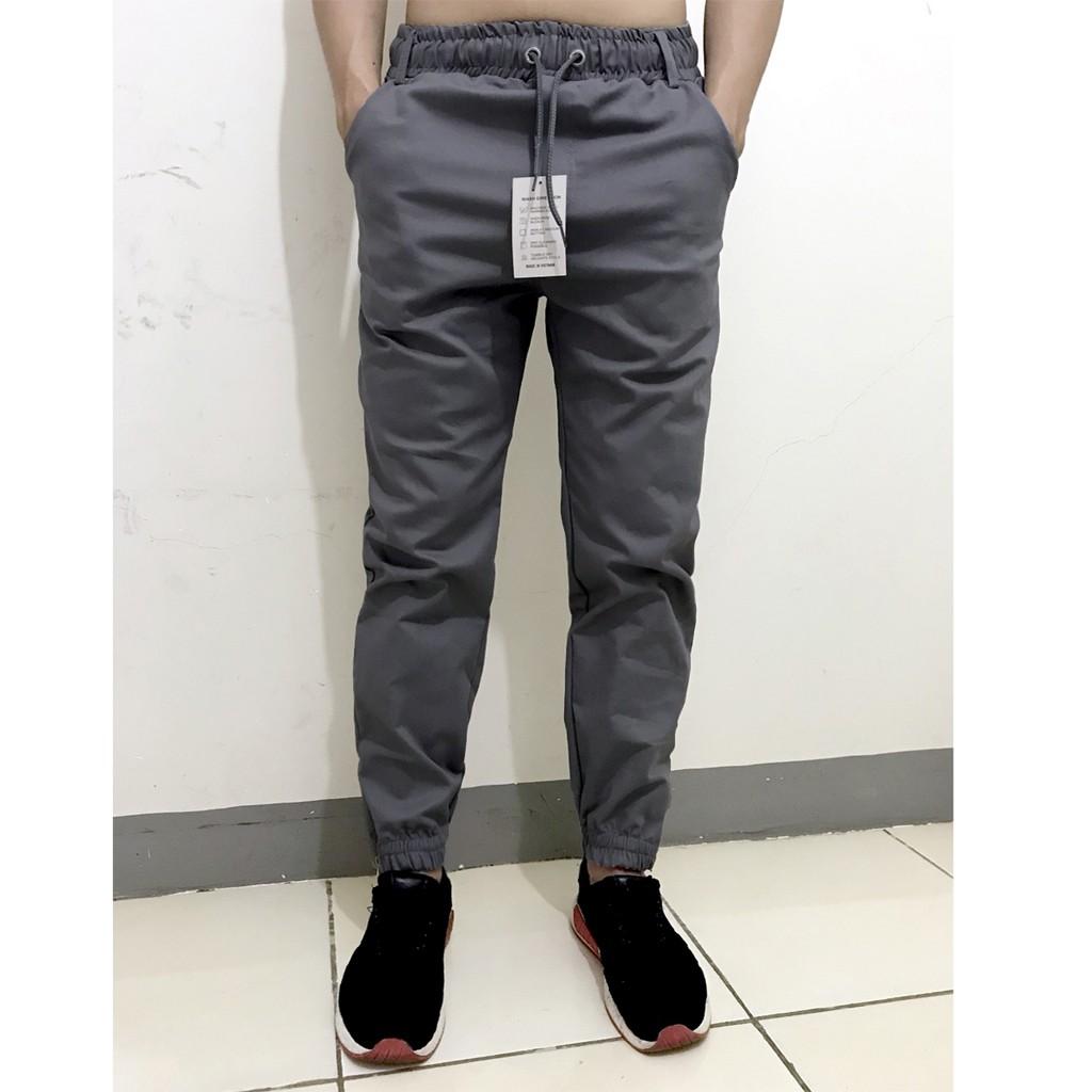 Quần jogger nam nữ vải kaki co giãn ống bó khóa zip cá tính