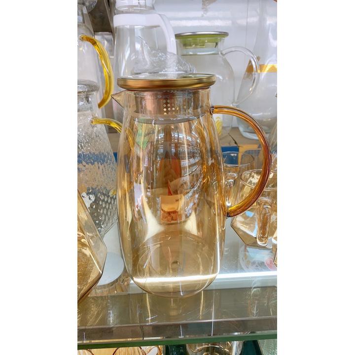 Bình đựng nước uống thủy tinh vàng bầu trơn