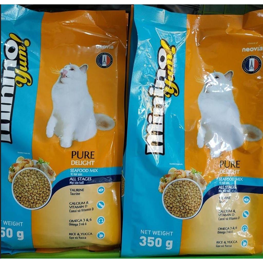 Thức ăn cho mèo Minino Yum - 1,5kg. Hạt khô cho mèo Minino. Thức ăn khô cho mèo lớn hương vị hải sản.