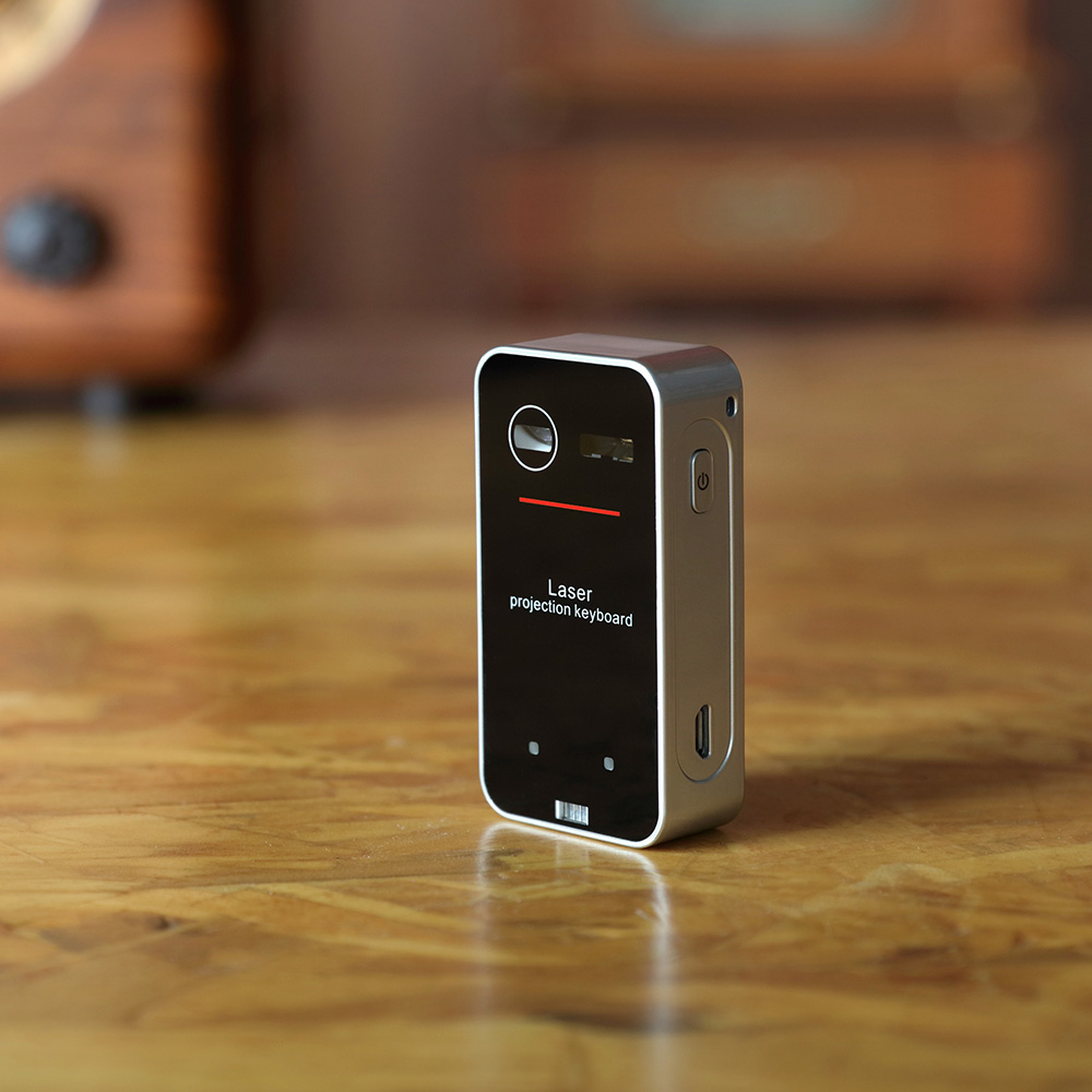 Bàn phím và chuột cảm ứng ảo di động mini Chuột BT QWERTY Projection cho điện thoại thông minh / PC / máy tính bảng