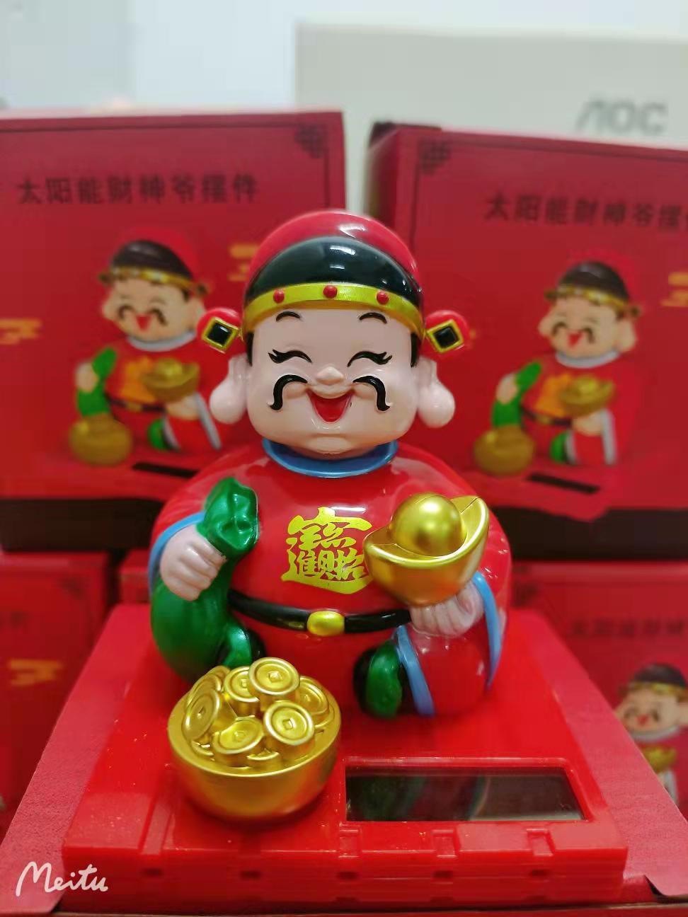 Tượng phật thần tài gật đầu năng lượng