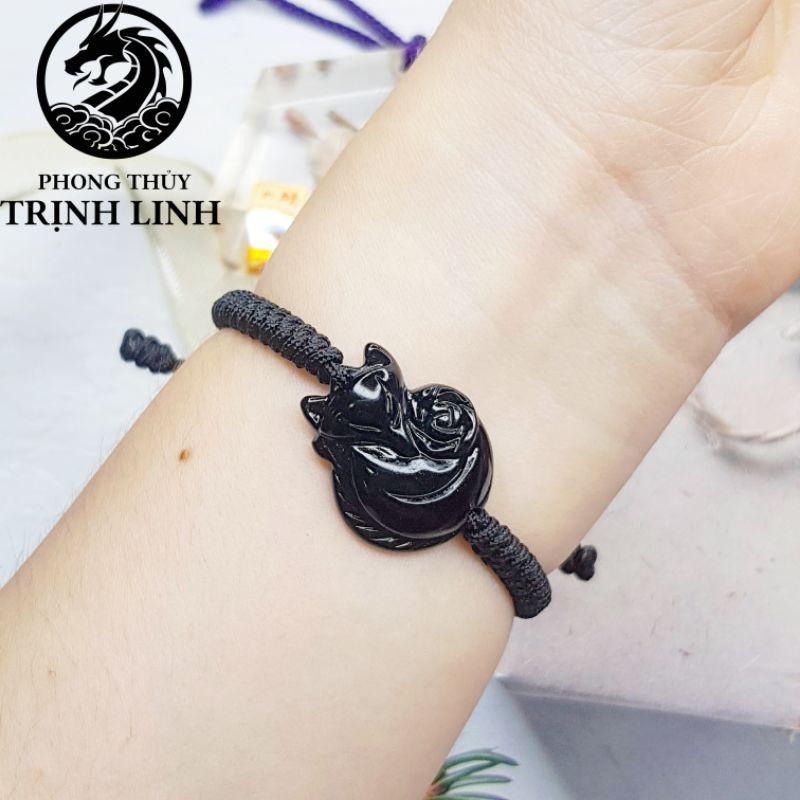 VÒNG TẾT CHỈ HỒ LY ĐEN ÔM HOA