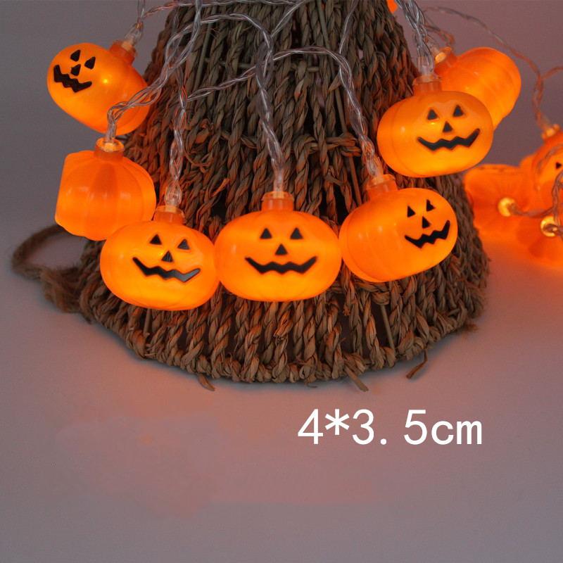 Dây 20 đèn led màu vàng hình bí ngô dùng pin trang trí Halloween