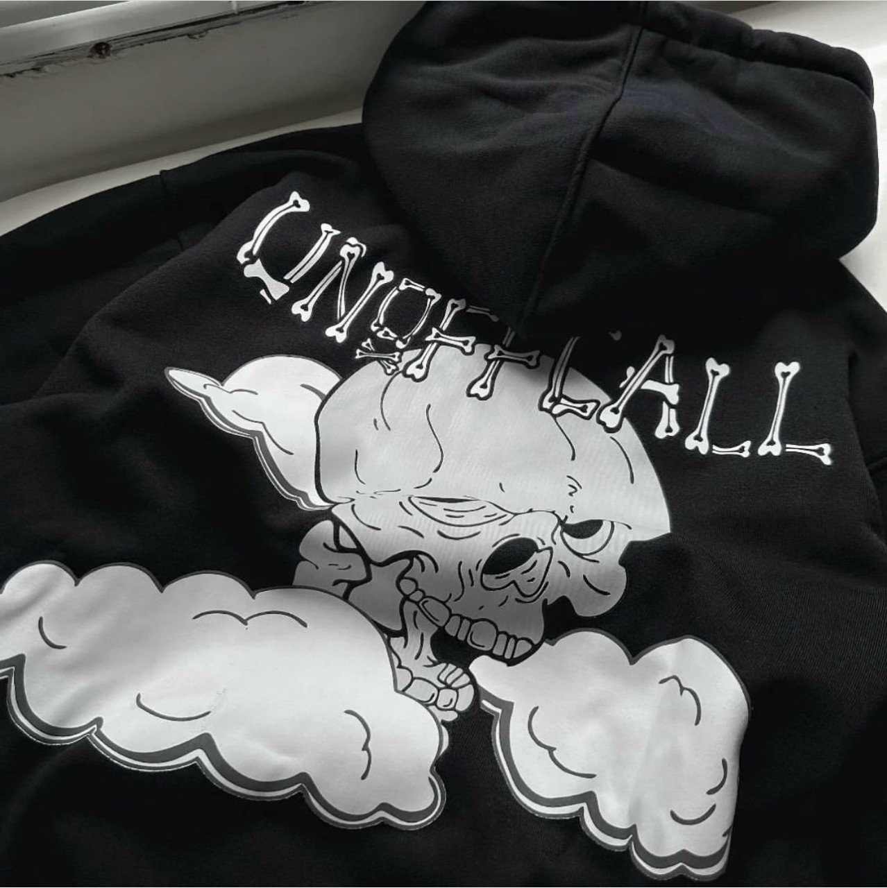 Áo khoác hoodie nỉ bông dày dặn tag UNOFFCALL đầu lâu 3 túi màu đen form rộng unisex nam nữ, áo hoodie cặp đôi