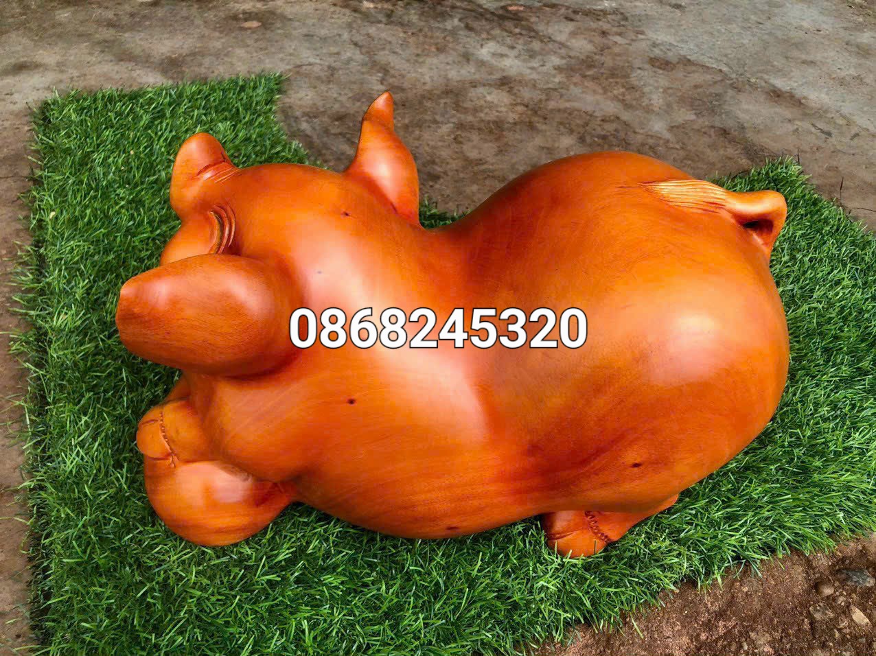 Tượng con heo (lợn ) phong thủy tài lộc bằng gỗ hương đá kt 35×22cm 