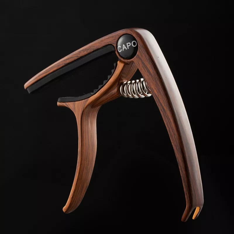 Capo Nâng Tone - Kẹp Cần Đàn Guitar Acoustic JX-05 (Kèm 3 Pick Gảy )