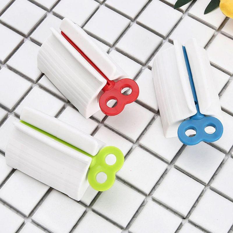 DỤNG CỤ KẸP NẶN KEM ĐÁNH RĂNG MẪU MỚI CHẤT LIỆU NHỰA CỨNG
