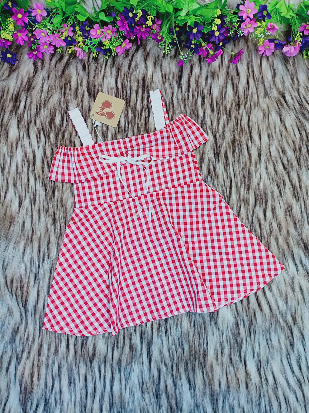 Đầm kate -Ca rô dây phối rớt vai Nhí