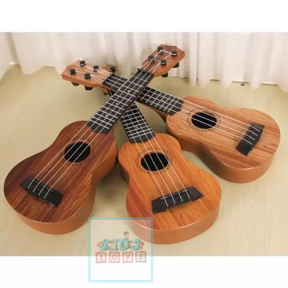 Đàn ukulelee cho bé tập nhạc, chất liệu nhựa ABS giả gỗ bền bỉ cứng cáp, đồ chơi phát nhạc trẻ em