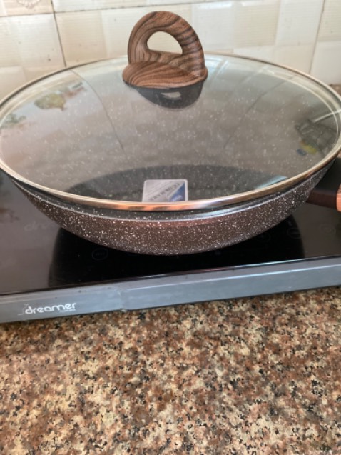 Chảo méo không đậy được lắp