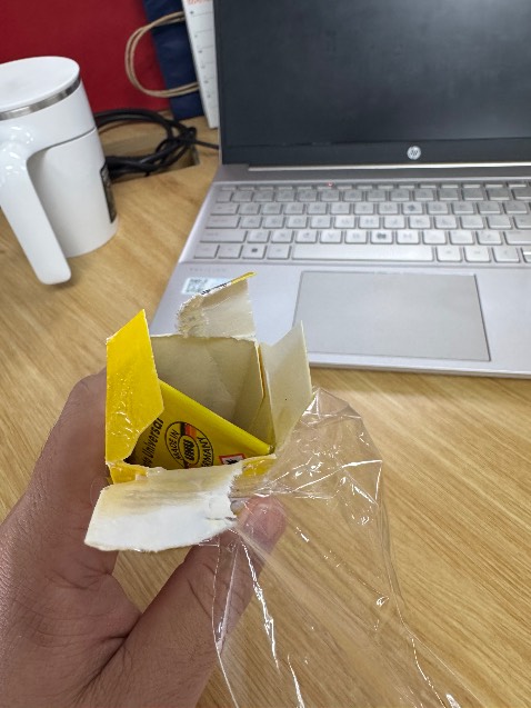 Bao bì còn nguyên nhưng bị chảy keo bên trong