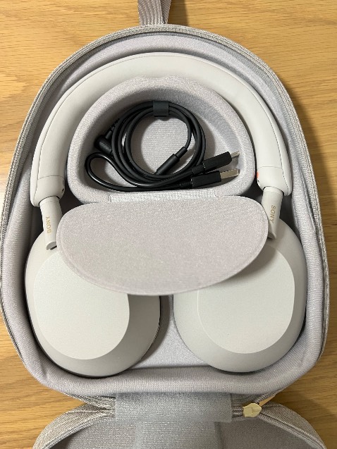 Well-wrapped. Genuine seals. Authentic. A little bulky what with the protective case, but the headphones have a great feel and quality. They look great!