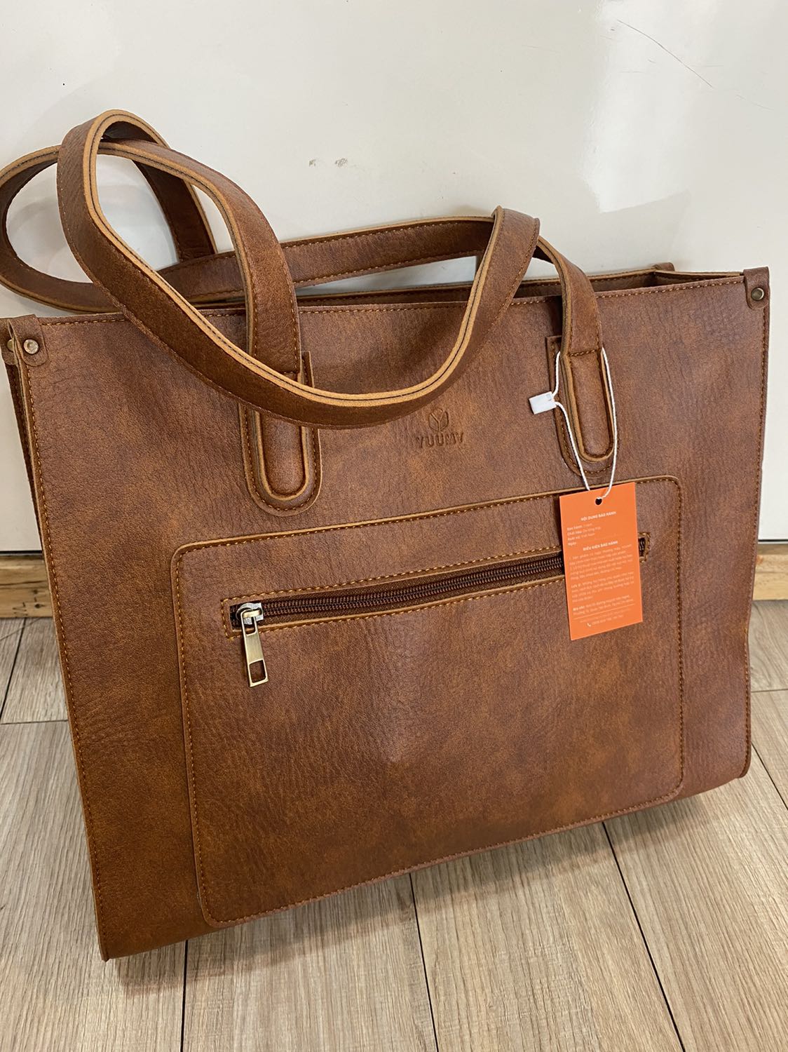 Túi đẹp mang đi dạy đựng được nhiều hồ sơ , giáo án, sài rất bền, quai đeo chắc chắn, rất đáng tiền mua , tặng shop 5 sao nè hehe