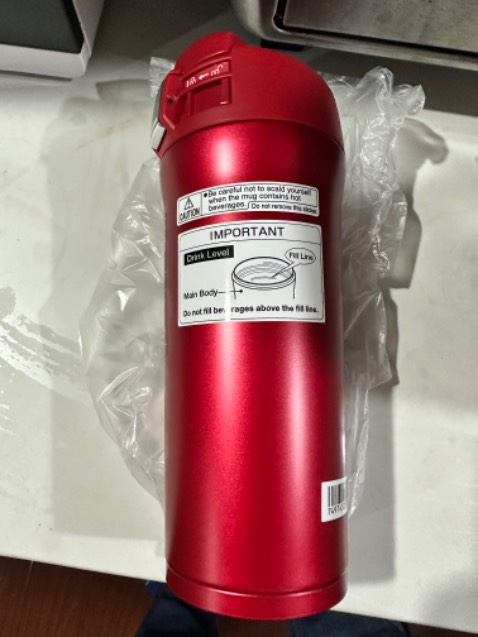 Đặt mua bình vỏ màu inox nguyên bản, shop lại giao màu đỏ.