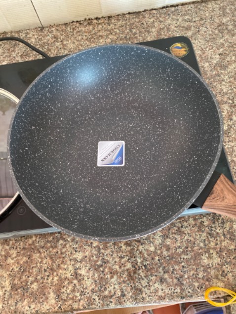 Chảo méo không đậy được lắp