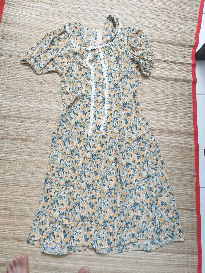 làm sao để trả lại sp vì vải và mẫu đầm ko giống hinh