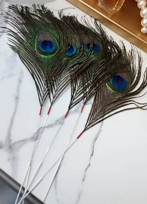 Xinh xỉu luôn,Lông công như mô tả, sử dụng cảm thấy thoải mái, rất ok nha