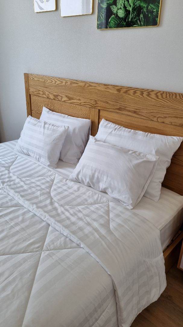 gối xài rất tốt và êm ngủ đã lắm nha mọi người, chất cotton nên nằm hơi sột soạt chút , khá giống lông vũ thật