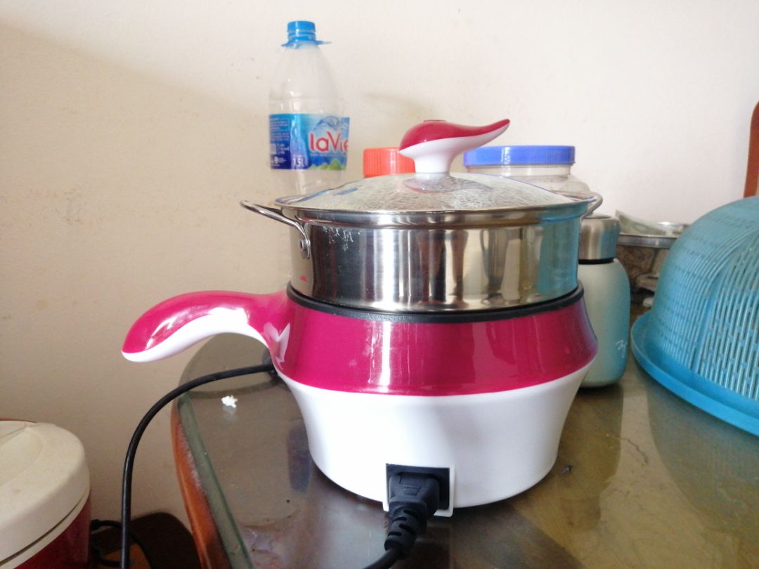 Nồi dùng đựơc so với giá mới sd có mùi nhựa, , giao hàng nhanh