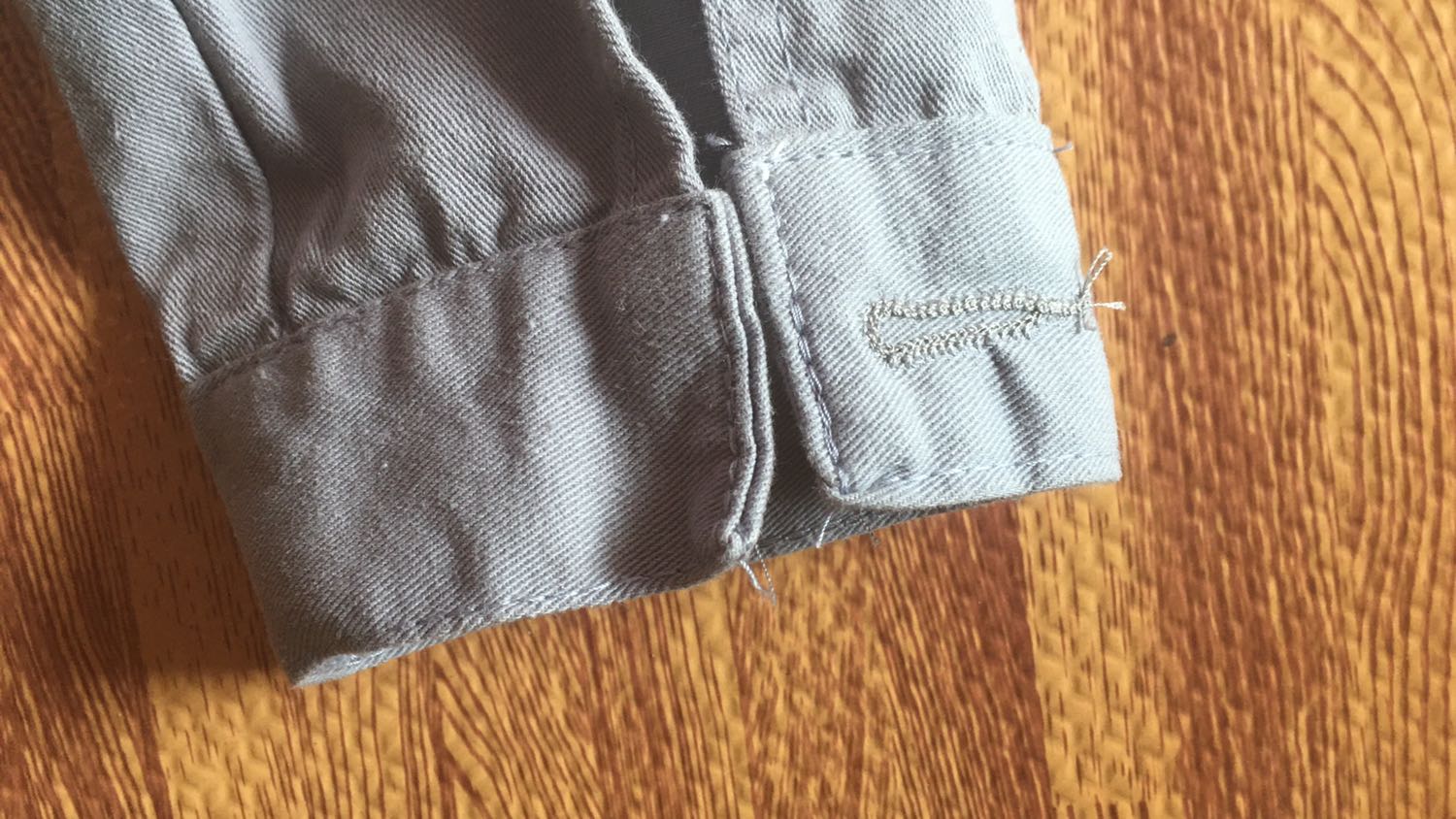 Áo size không đúng tay áo mất cúc