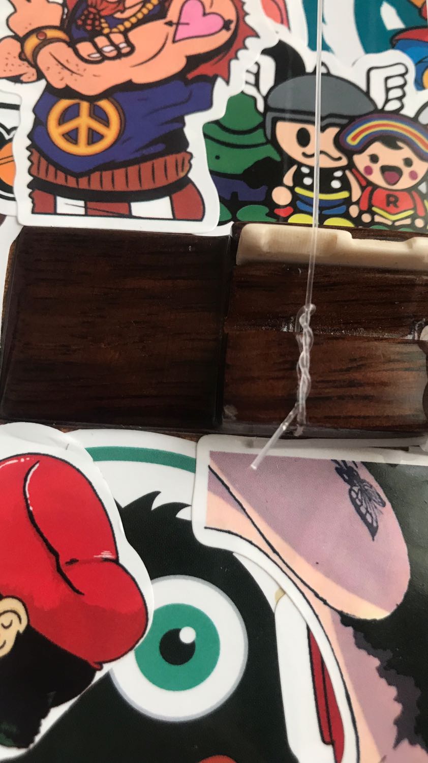 Dây đàn quá ngắn, màu trên ảnh màu đen nhưng giao về thì màu trắng đục