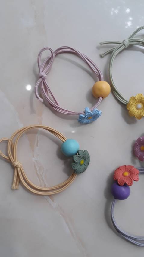 dây buộc tóc NASI đẹp lắm nha, giá rẻ, giao hàng nhanh, gói hàng cẩn thận. Tuyệt vời!