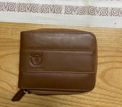 Bóp rất đẹp, rất ưng ý. Sẽ ủng hộ shop sau. Thanks