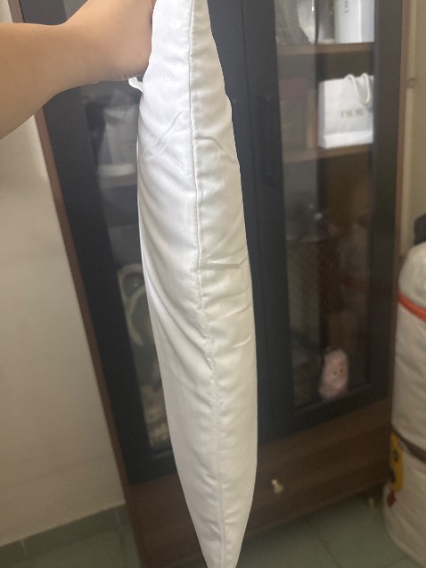 Gối cho bé nên rất vừa vặn, ko bị cao. Chất mềm êm lắm nha