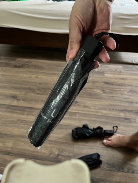 Bấm trơn tru, trông rất khôn, vải chống nước, thanh chống chắc chắn