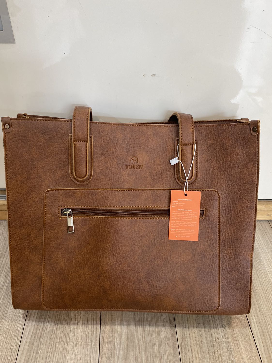 Túi đẹp mang đi dạy đựng được nhiều hồ sơ , giáo án, sài rất bền, quai đeo chắc chắn, rất đáng tiền mua , tặng shop 5 sao nè hehe