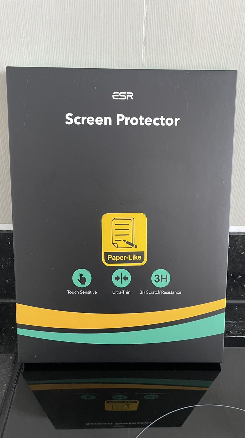 Sealed and genuine!

If you are willing to sacrifice a little sharpness for this paper feel, then go ahead and buy this sticker. Yes, sticker. It is not really a screen protector like tempered glass or anything like that, so handle your device with care. This sticker/protector looks a little grainy (as shown in the last two photos), which I don’t mind because I don’t use my iPad to watch movies or edit photos or video. I prefer to AirPlay that content, so losing a little bit of sharpness in the iPad screen is fine by me. 

I also think that the sticker/protector dims the light a little. My eyes feel more comfortable when reading/writing on my iPad for long periods of time, especially at night. 

This sticker/protector is also less prone to get fingerprint marks. It feels great to write on this thing. Give it a try if you like.