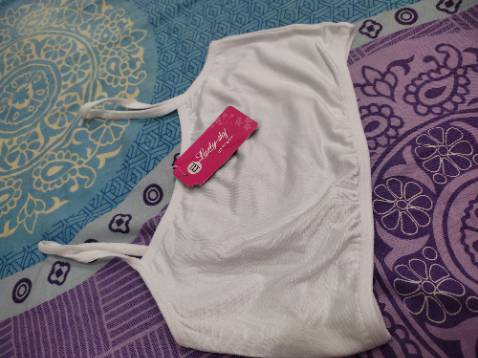 Chất vải co giãn, mềm mát. Phía trước may 2 lớp dày dặn. Bé 42kg mặc thoải mái. Rất hài lòng.