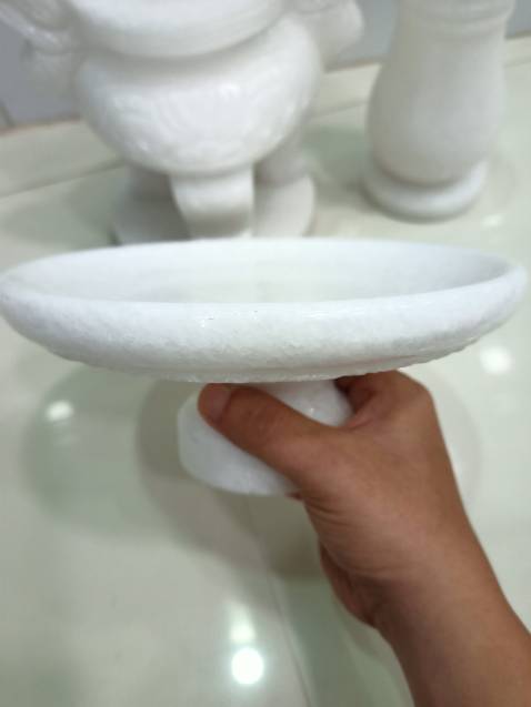 Sản phẩm đá 100%. Điêu khắc rất tỉ mỉ. Shop đóng gói rất kỹ, bọc chống sốc rất dày, nên không bị sứt mẻ gì. Cảm ơn shop nhiều nha